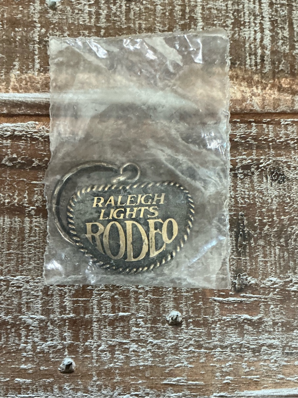 Raleigh Lights Rodeo Keychain Brass